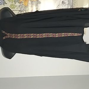 Black open shoulder blouse with colorful patterns.  Size:L.